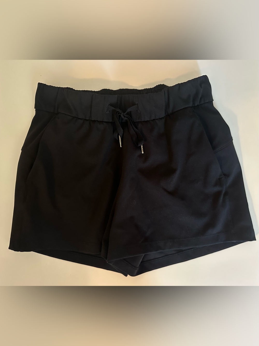 Lululemon Black On the Fly Mid Rise shorts